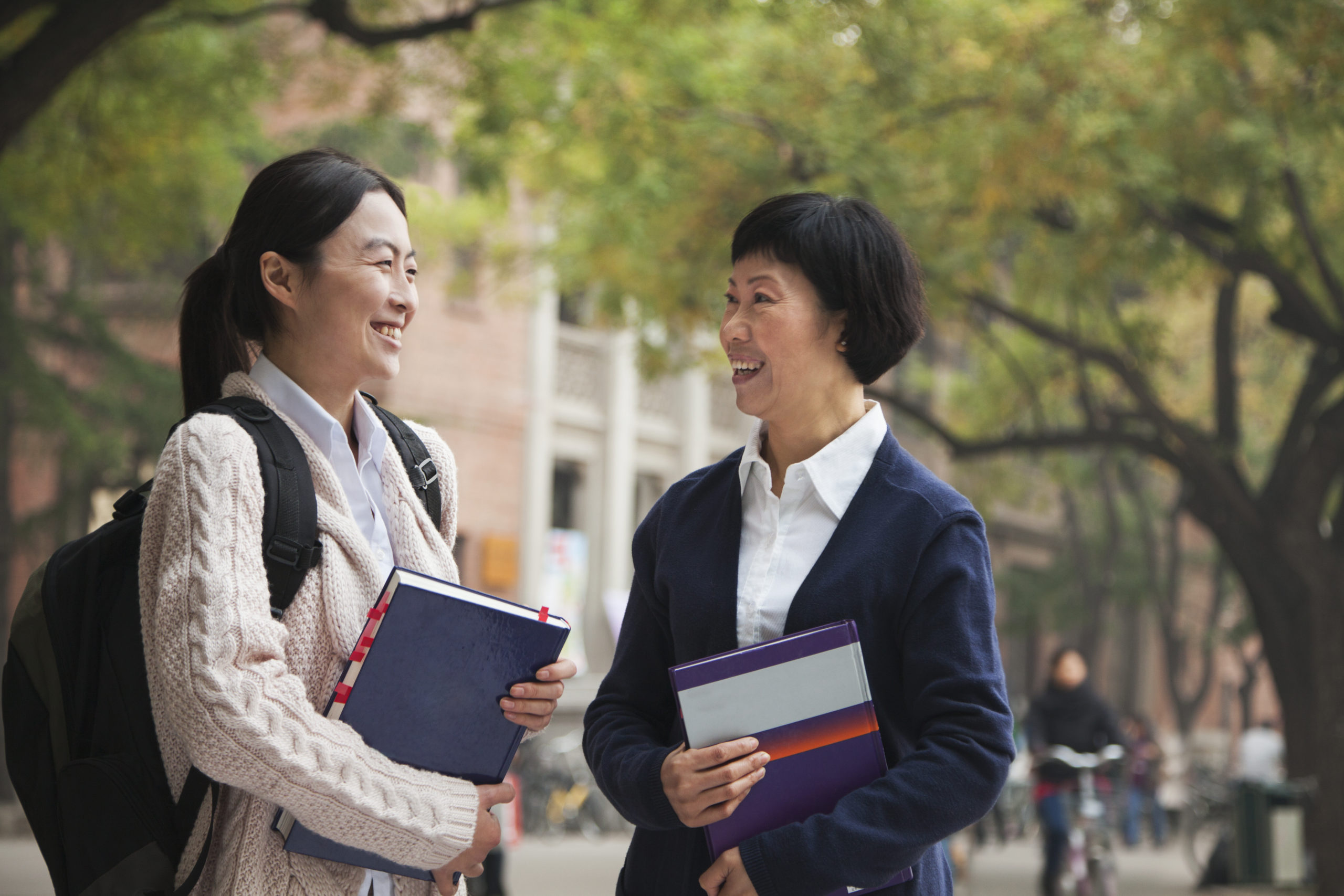 University Student and Professor on Campus